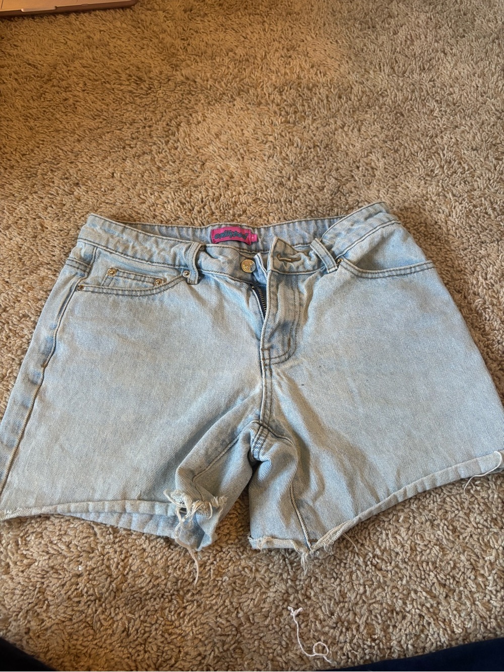 Edikted Light Wash Denim Cutoff Shorts